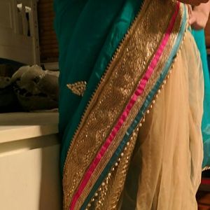 Brand new sari with unstiched blouse.